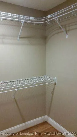 a view of a room with racks on the wall