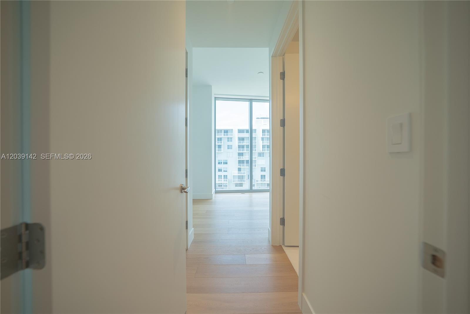 175 Southeast 25th Road, Unit 702 Miami, FL 33129 - Photo 20 of 30 a view of hallway with wooden floor