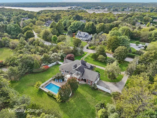 an aerial view of a house with a garden