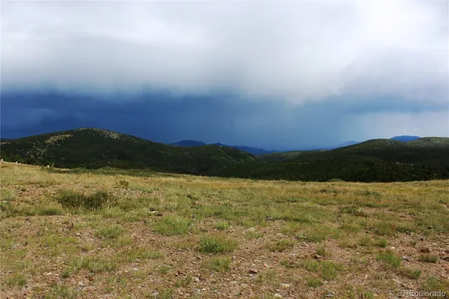 a view of lake and mountain