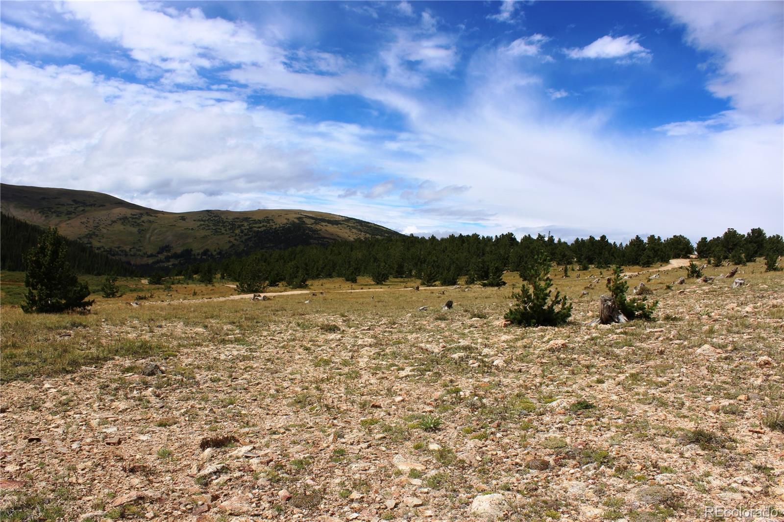 0 Kingston Peak Road Idaho Springs, CO 80452 - Photo 7 of 38 a view of a lake with sunset