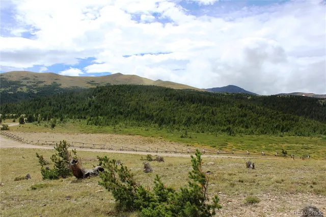 a view of a lake with mountains in the background