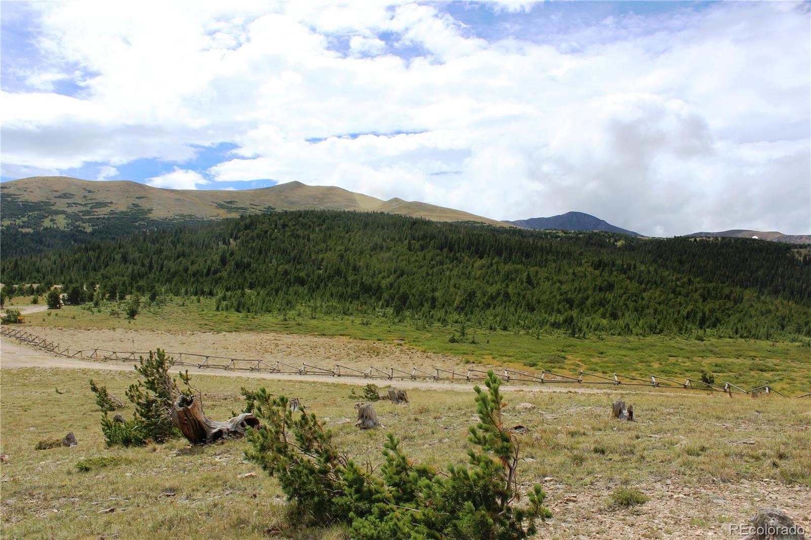 0 Kingston Peak Road Idaho Springs, CO 80452 - Photo 9 of 38 a view of a lake with mountains in the background