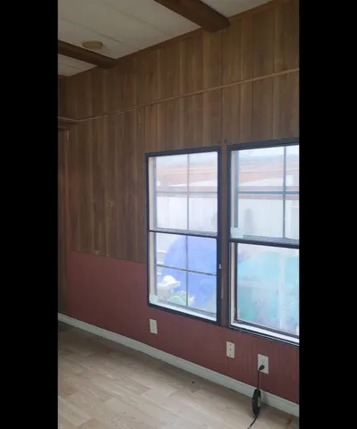 a bathroom with a granite countertop sink