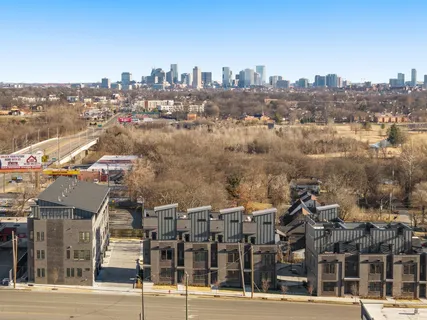 a picture of a bench in front of a wall