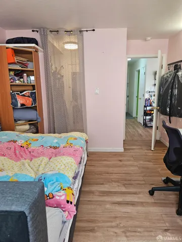 a kitchen with a sink a refrigerator and washer