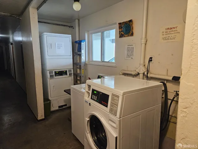 a view of a parking space with a car parked in garage