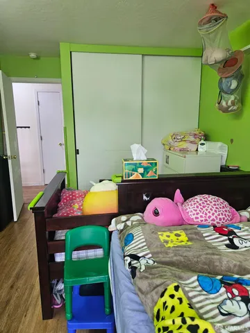 a bathroom with a sink toilet and mirror