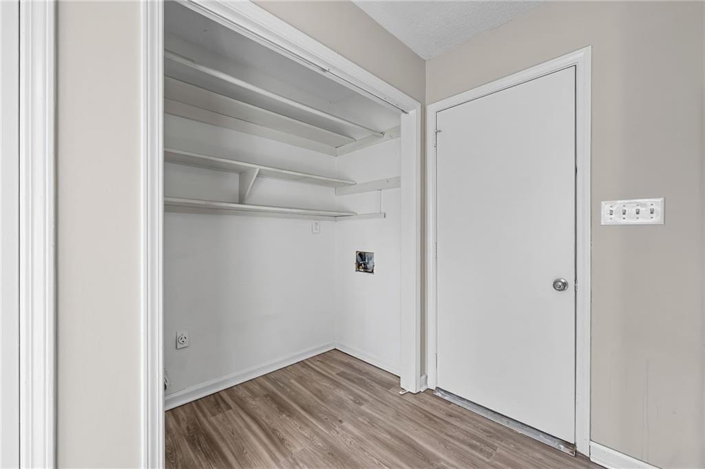 5345 Memorial Lane Southwest Powder Springs, GA 30127 - Photo 18 of 35 a view of a room with wooden floor