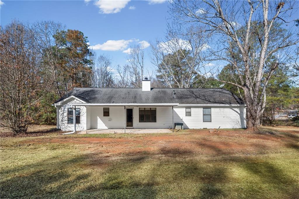 5345 Memorial Lane Southwest Powder Springs, GA 30127 - Photo 31 of 35 a view of a house with a yard