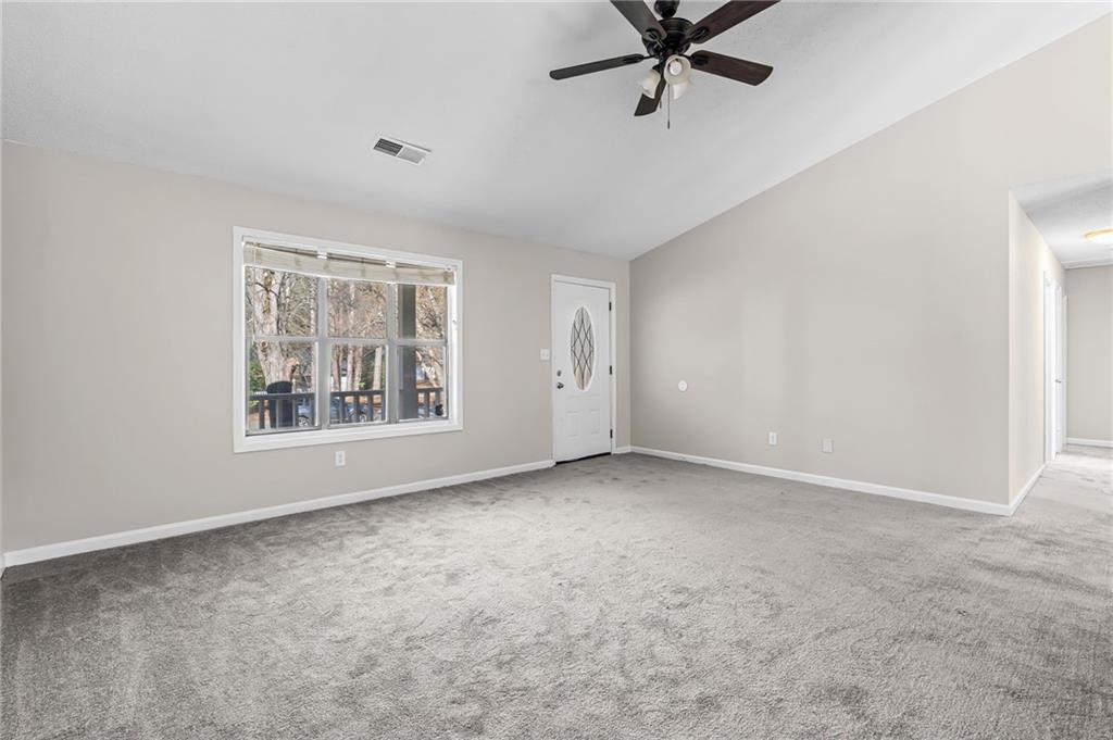 5345 Memorial Lane Southwest Powder Springs, GA 30127 - Photo 7 of 35 a view of an empty room with a window