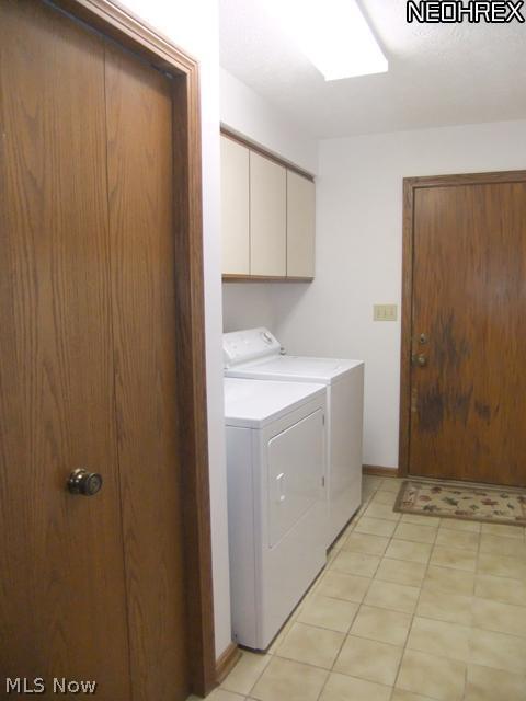 4601 Pinewood Path Akron, OH 44321 - Photo 13 of 23 The first floor laundry room is located off of the dinette area and offers access to the garage.