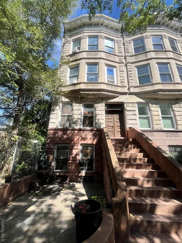 front view of a building with many windows