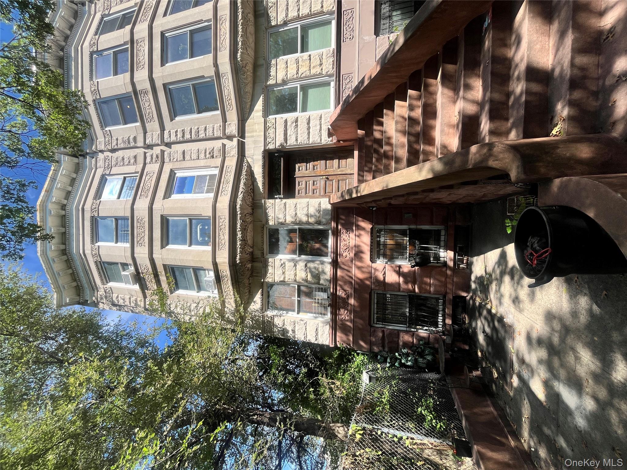 451 West 162nd Street, Unit 3 Manhattan, NY 10032 - Photo 1 of 12 front view of a building with many windows