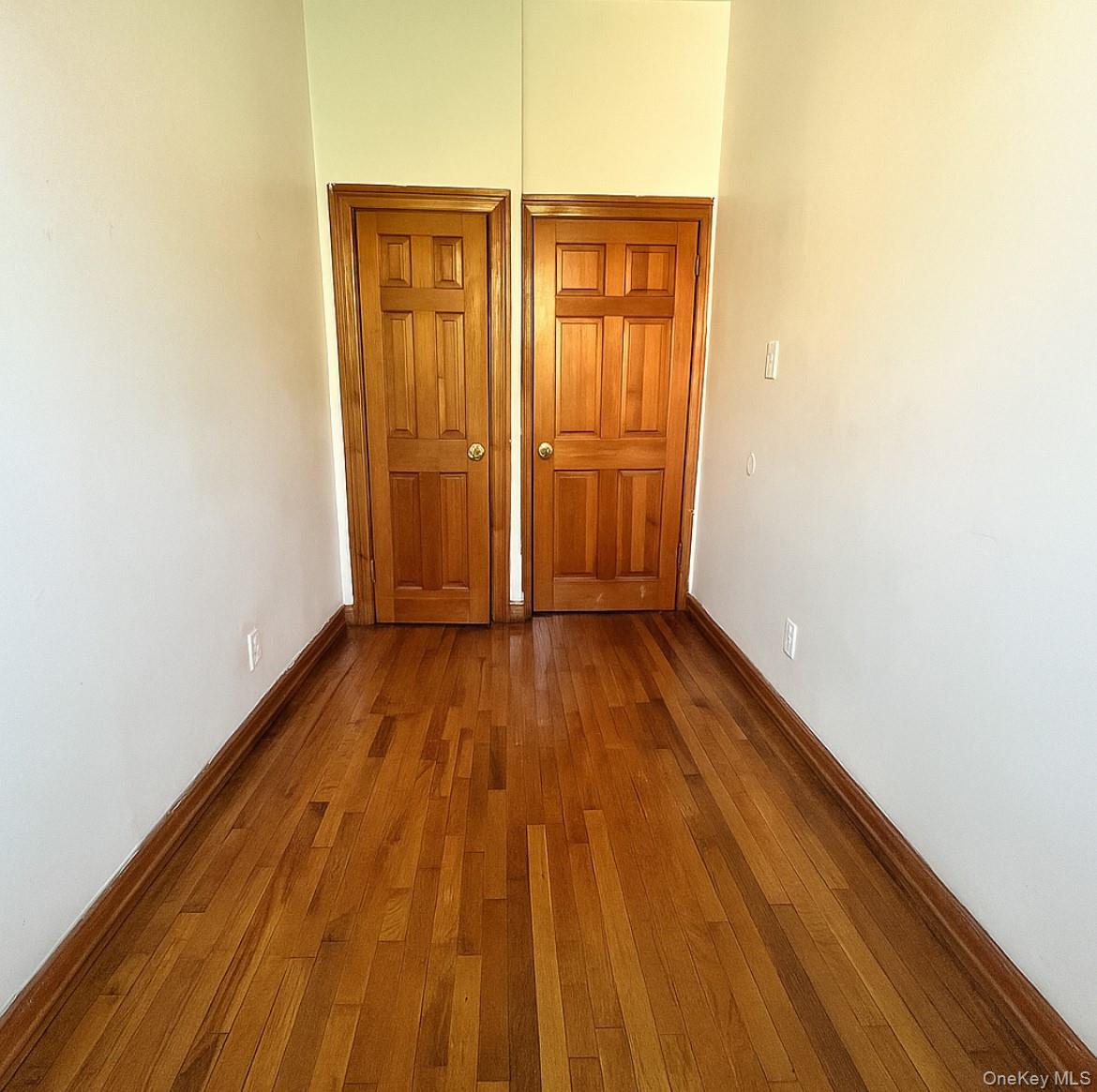451 West 162nd Street, Unit 3 Manhattan, NY 10032 - Photo 11 of 12 a view of a room with wooden floor