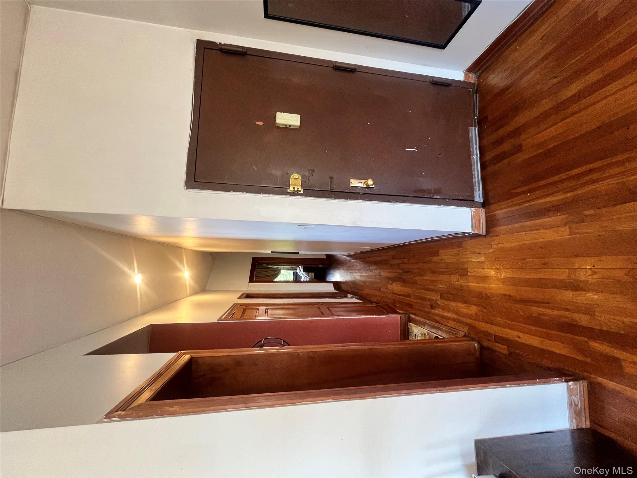 451 West 162nd Street, Unit 3 Manhattan, NY 10032 - Photo 4 of 12 a view of a hallway with wooden floor