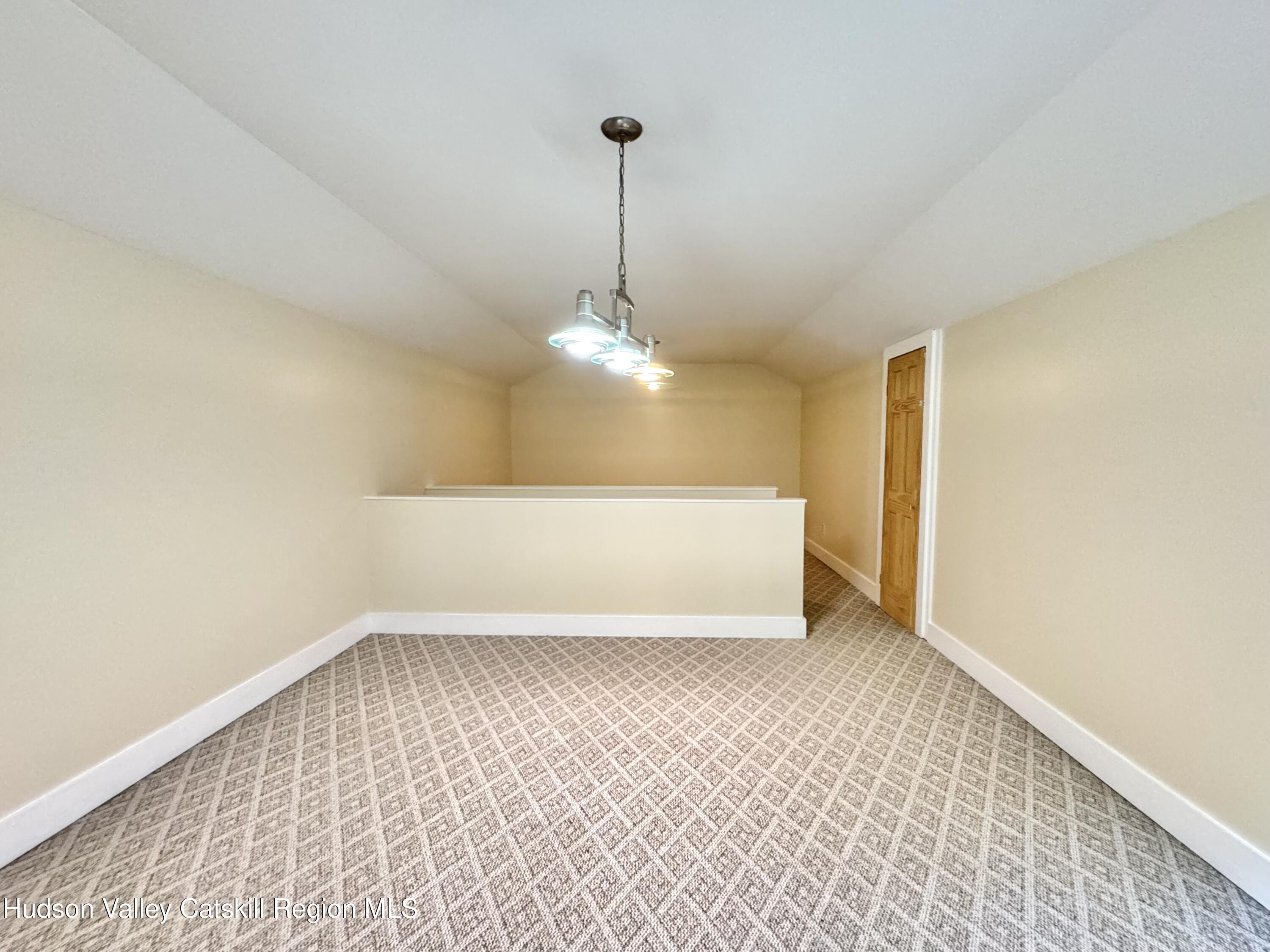 86 Paul Horn Road Catskill, NY 12414 - Photo 13 of 41 a view of a room with a ceiling fan and a rug