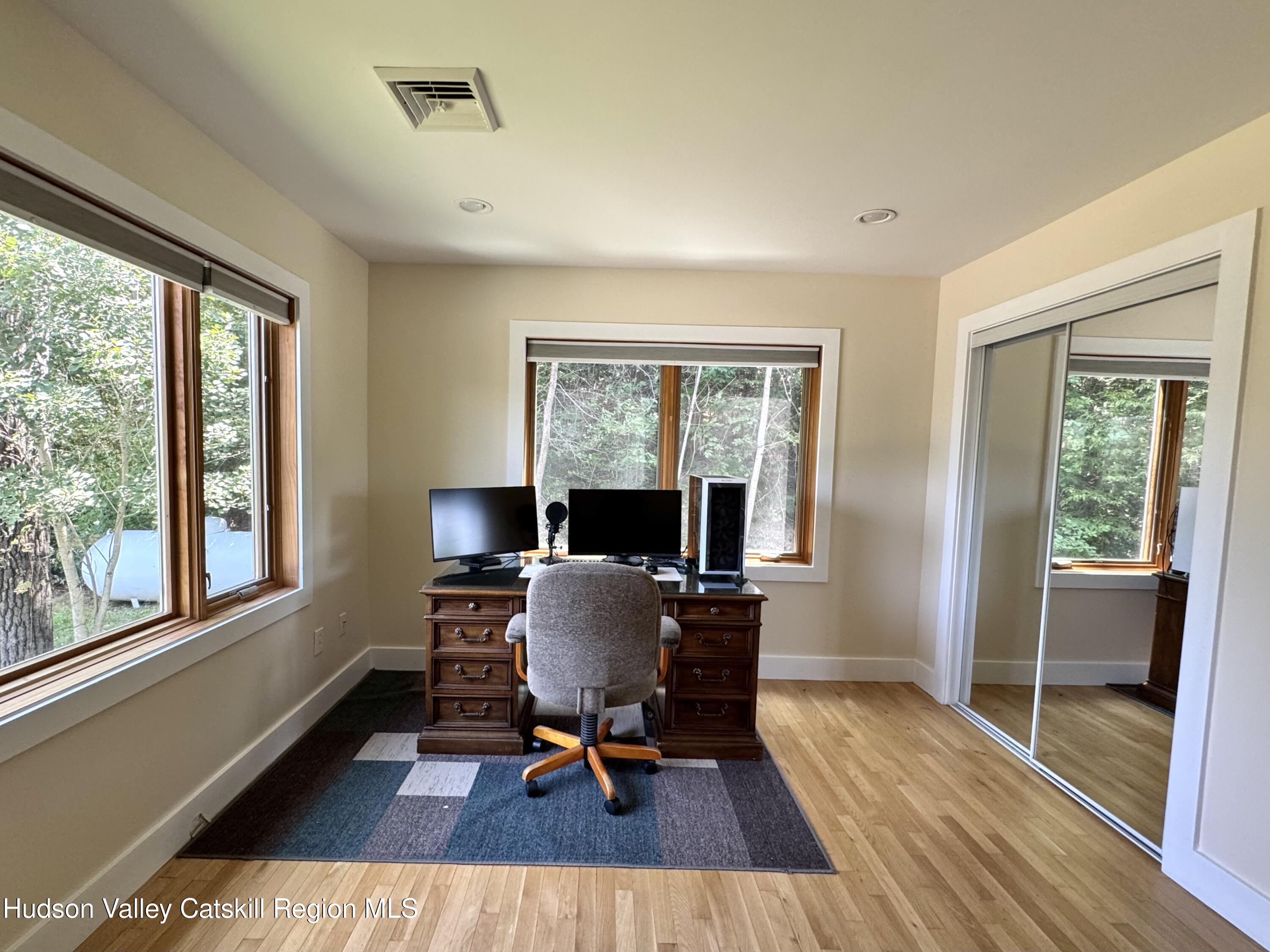 86 Paul Horn Road Catskill, NY 12414 - Photo 21 of 41 a view of a workspace with furniture and a window