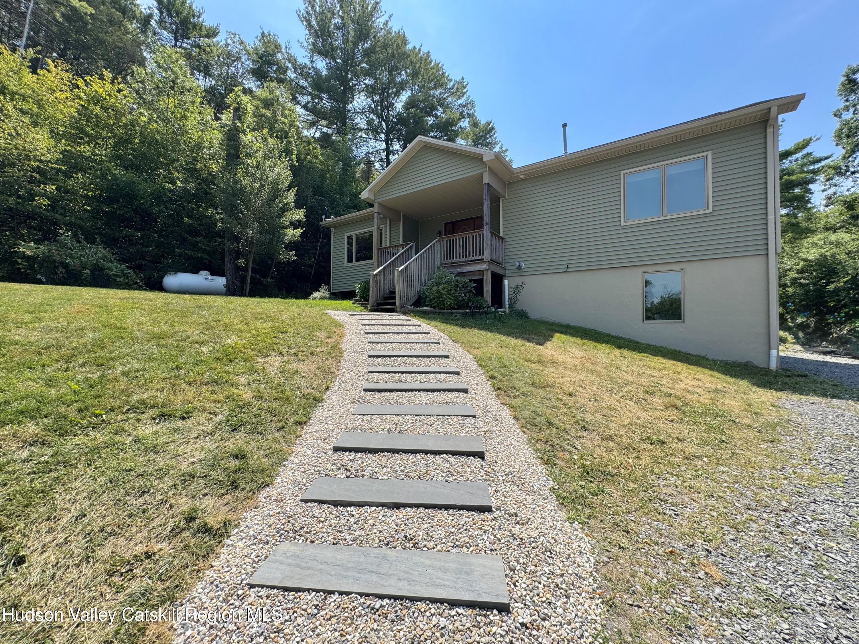 86 Paul Horn Road Catskill, NY 12414 - Photo 29 of 41 a front view of a house with a yard