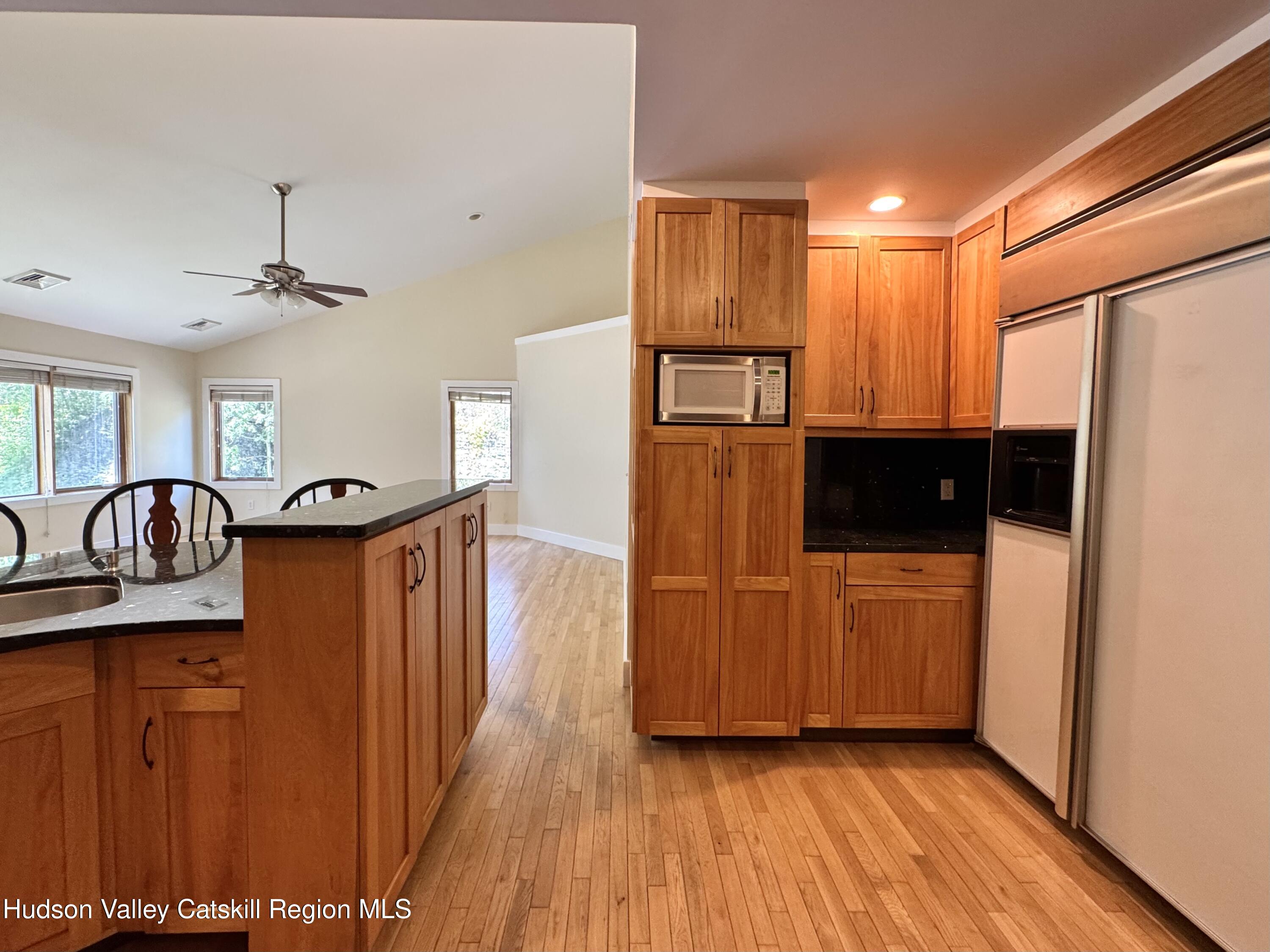 86 Paul Horn Road Catskill, NY 12414 - Photo 8 of 41 a view of kitchen with stainless steel appliances granite countertop cabinets and a refrigerator