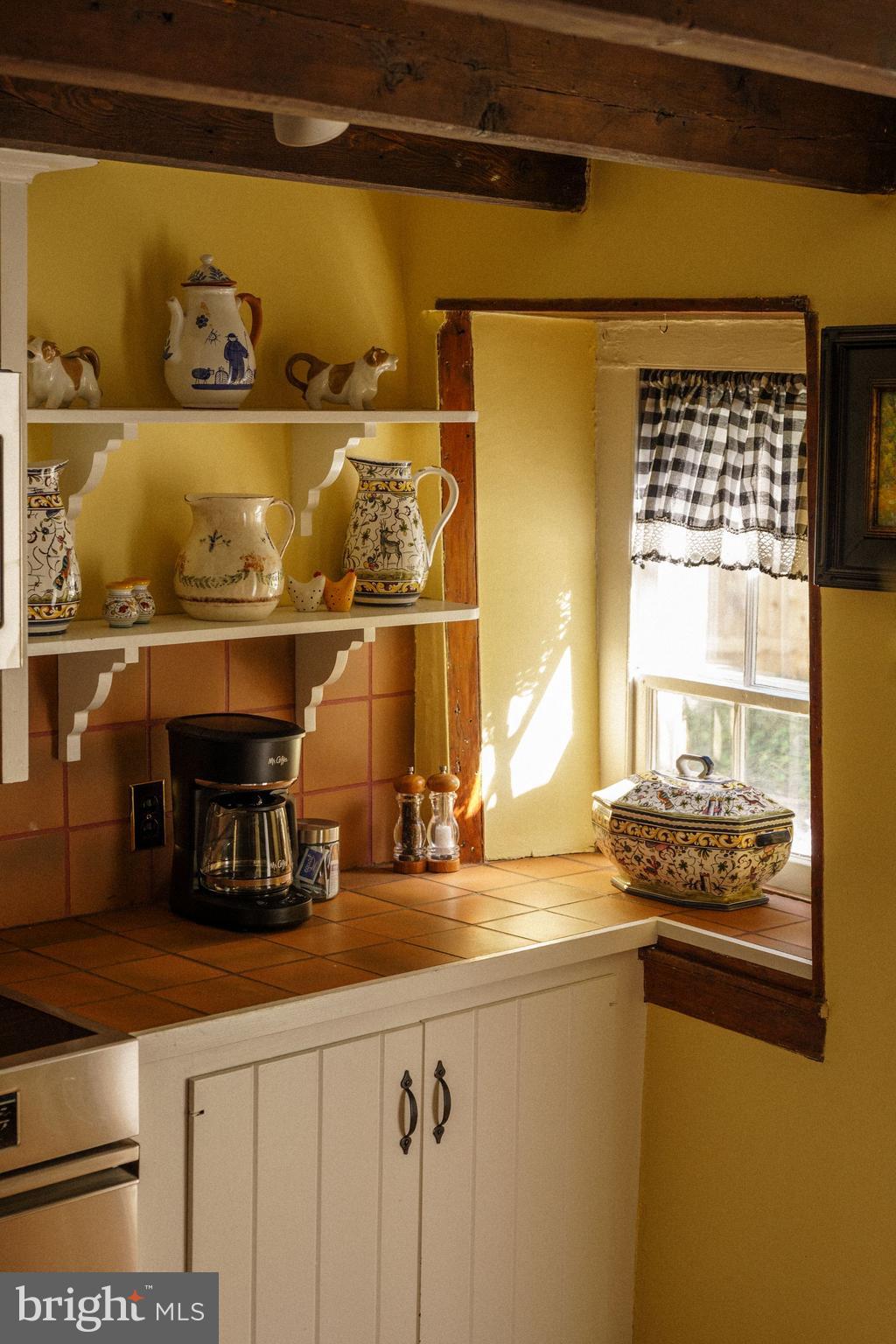 2943 Windy Bush Road Newtown, PA 18940 - Photo 18 of 49 a kitchen with a sink and a stove