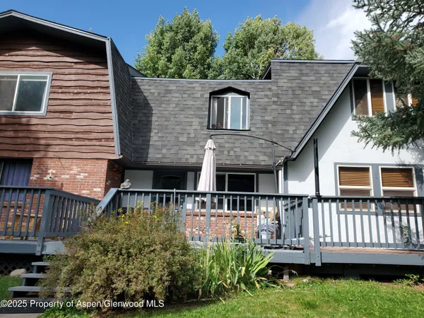 a house view with a garden space