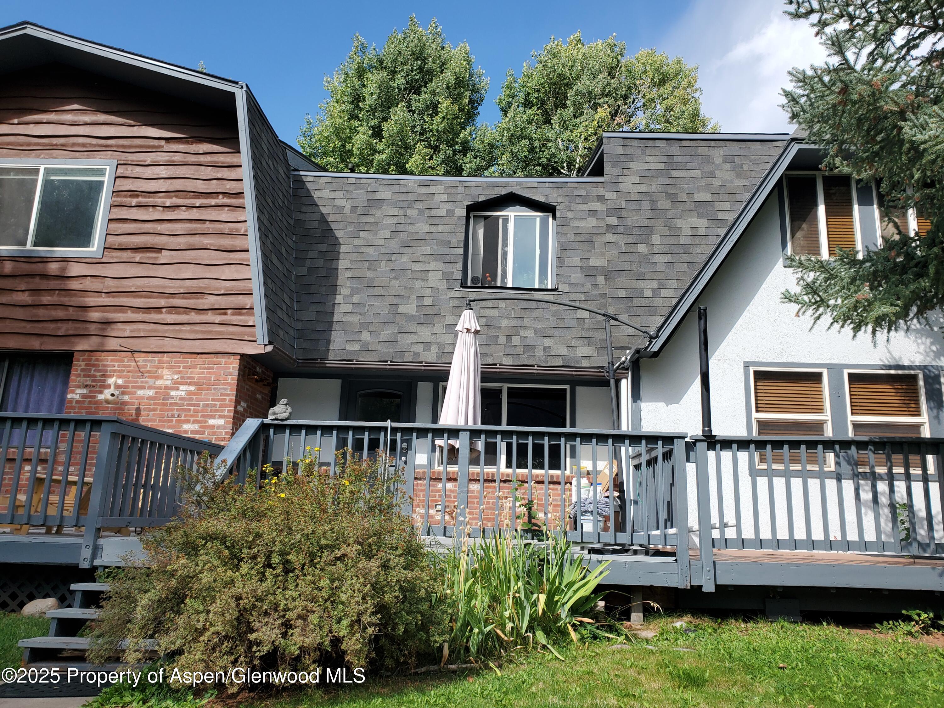 331 Holland Hills Road, Unit 5 Basalt, CO 81621 - Photo 1 of 19 a house view with a garden space