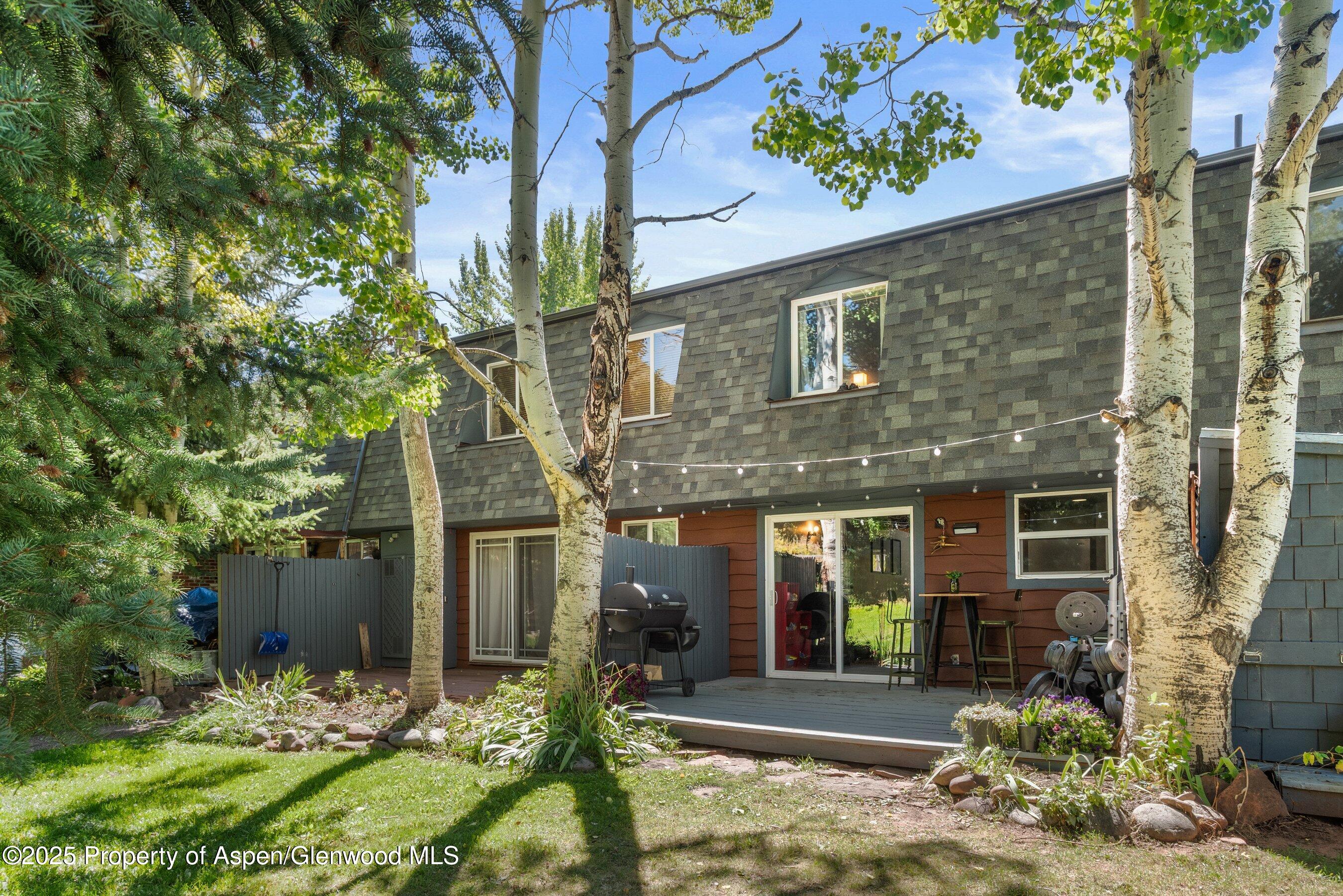 331 Holland Hills Road, Unit 5 Basalt, CO 81621 - Photo 15 of 19 front view of a house with a yard