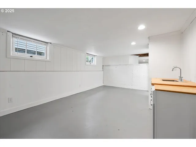 a view of a kitchen with a sink