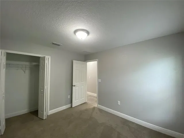 an empty room with an entryway