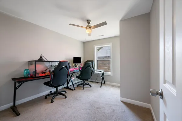 a view of a workspace with furniture
