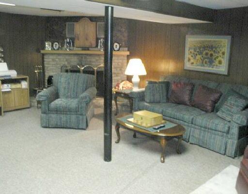 525 Holiday Road Vinton, VA 24179 - Photo 5 of 5 a living room with furniture and a painting on the wall