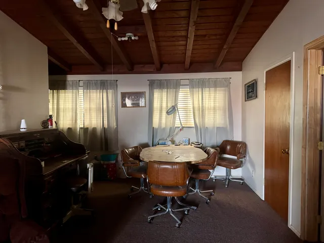 a view of a livingroom with furniture