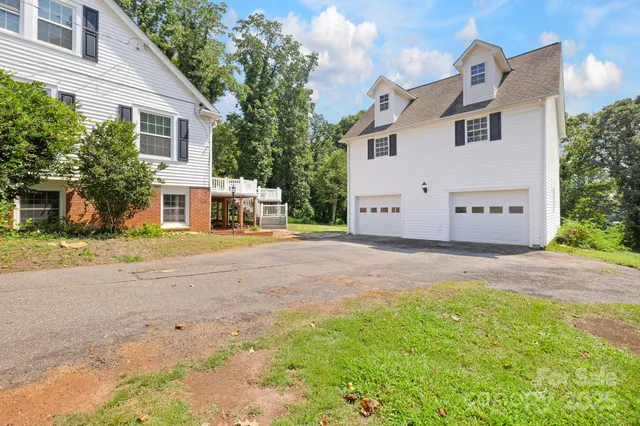 a view of a house with a street