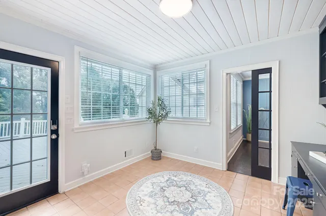 a bed room with a bed and a window