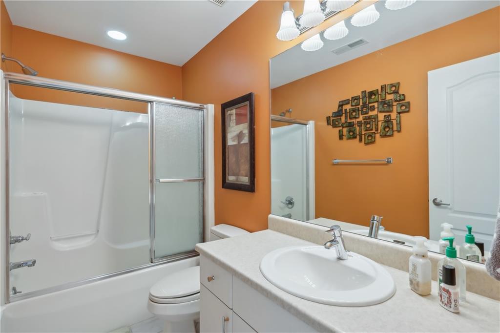 7091 Pinehurst Drive Presto, PA 15142 - Photo 15 of 29 a bathroom with a sink a toilet and shower