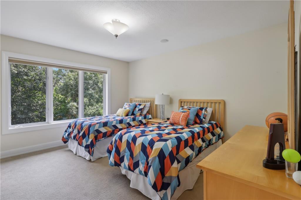 7091 Pinehurst Drive Presto, PA 15142 - Photo 16 of 29 a bed sitting in a bedroom next to a window