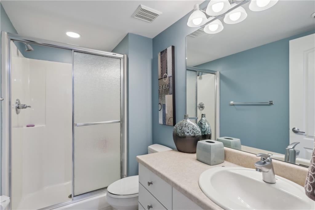 7091 Pinehurst Drive Presto, PA 15142 - Photo 19 of 29 a bathroom with a sink toilet vanity and shower