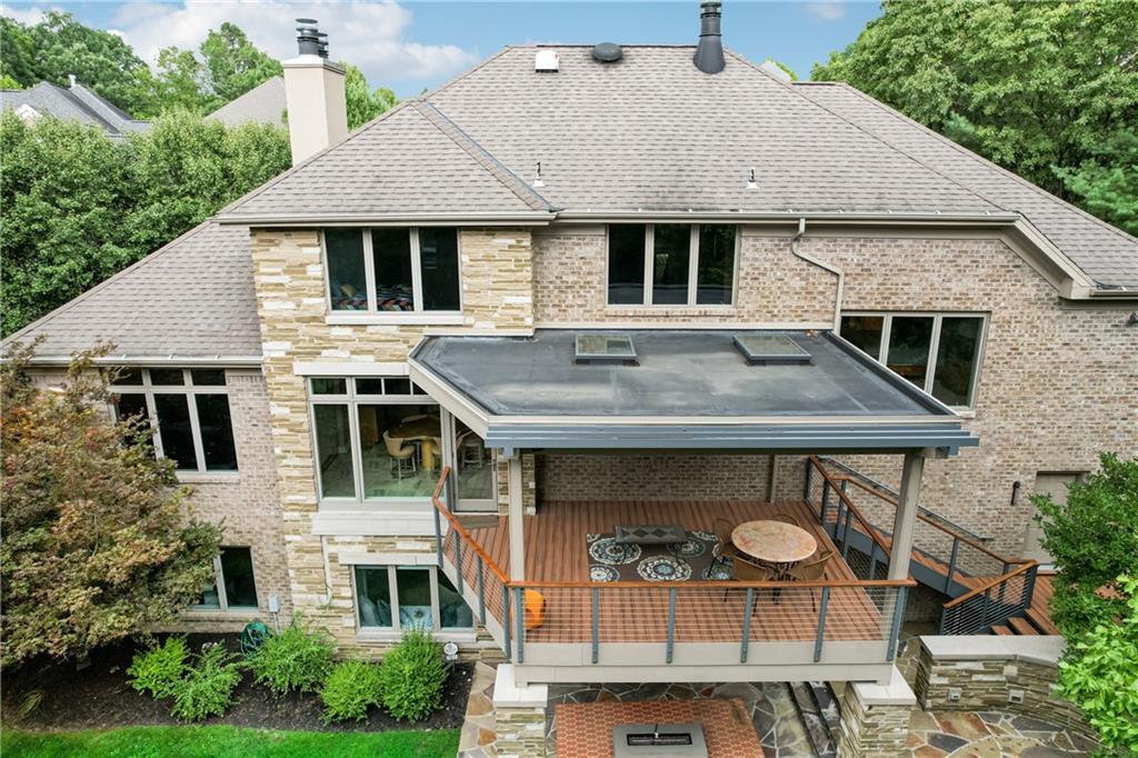 7091 Pinehurst Drive Presto, PA 15142 - Photo 27 of 29 a aerial view of a house with fountain plants and large tree