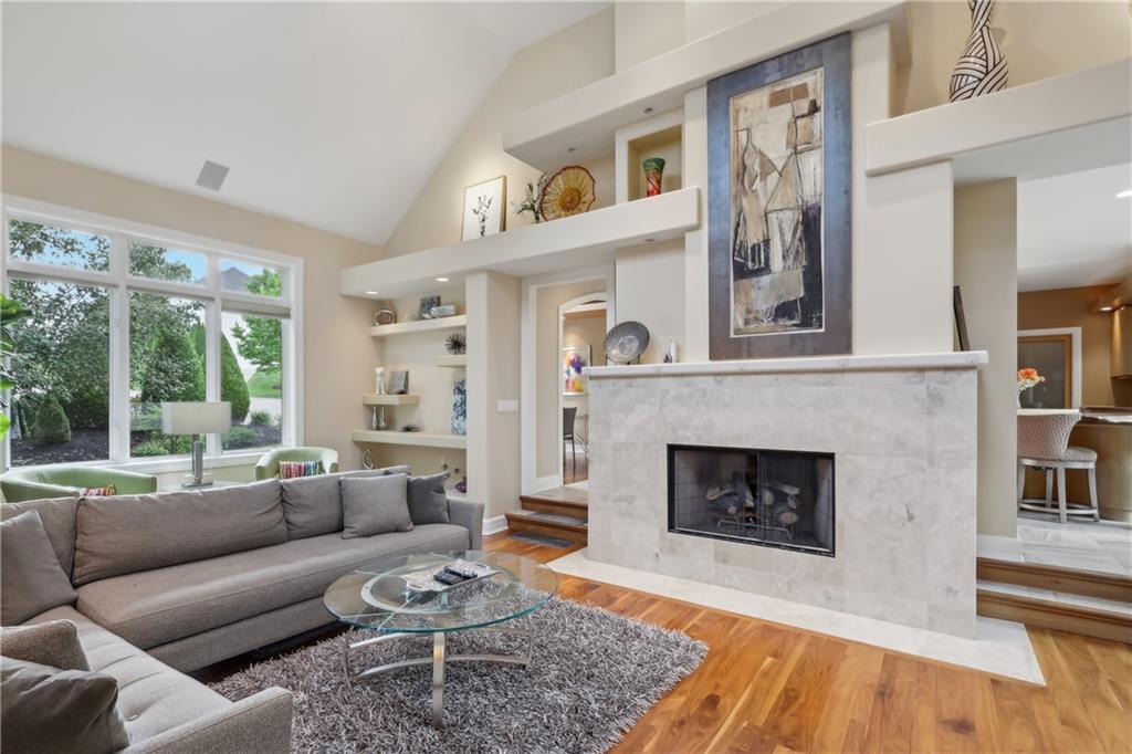 7091 Pinehurst Drive Presto, PA 15142 - Photo 7 of 29 a living room with furniture and a fireplace