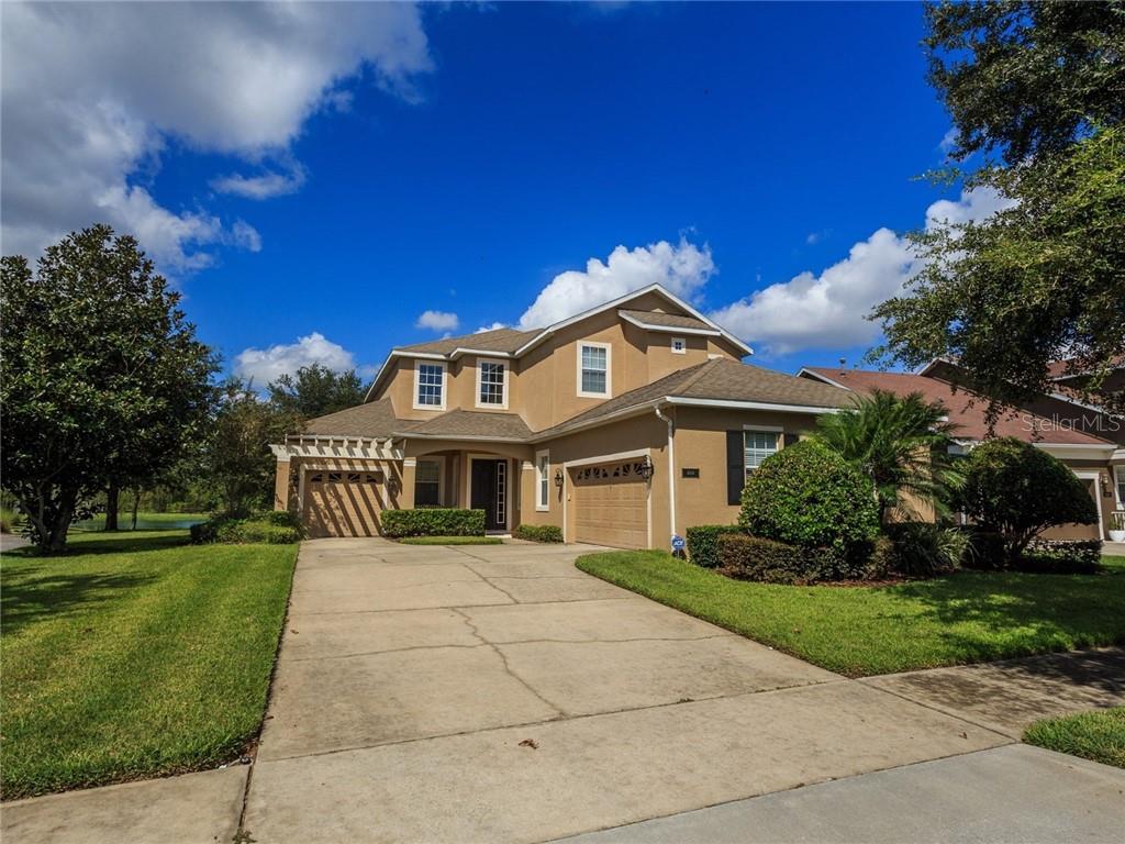 4350 Indian Deer Road Windermere, FL 34786 - Photo 1 of 1 a front view of a house with a yard