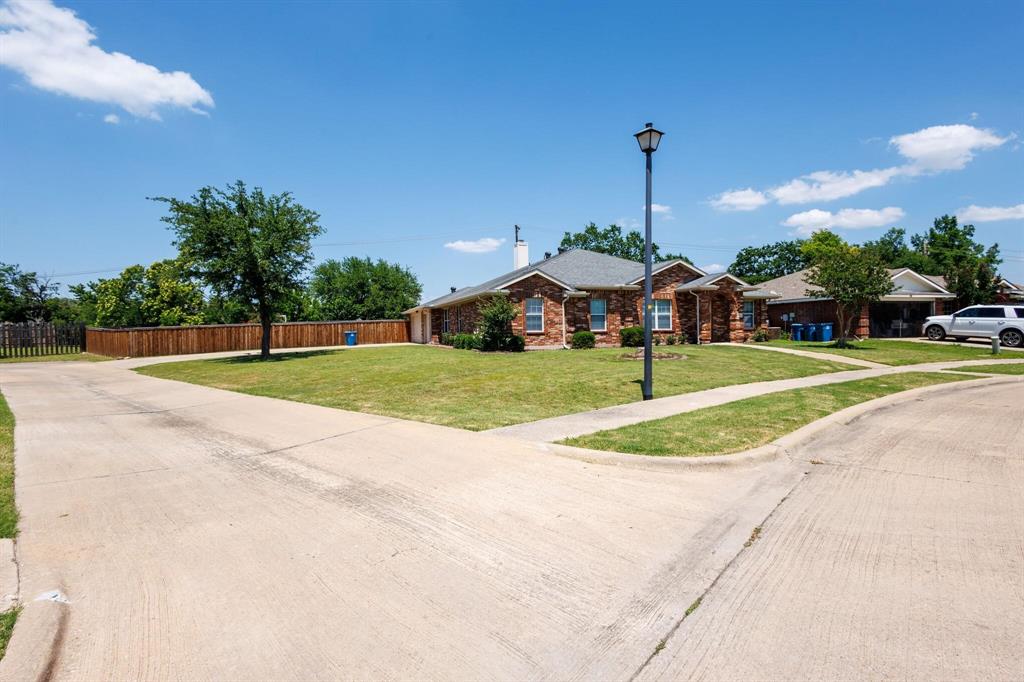 7218 Compass Point Drive Rowlett, TX 75089 - Photo 2 of 4 a view of a playground with basketball court