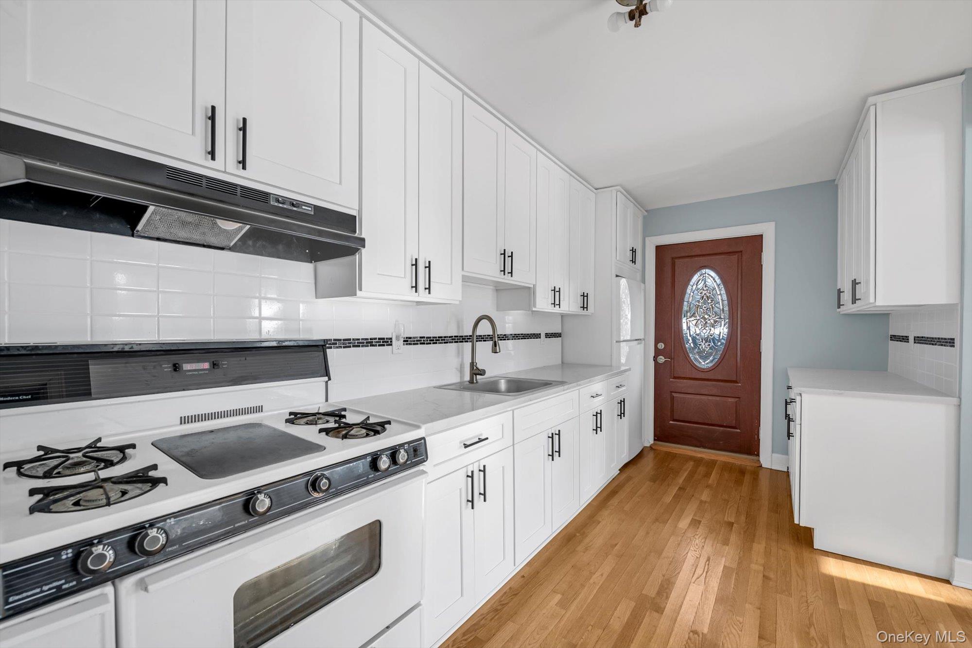 1117 St Johnland Road Kings Park, NY 11754 - Photo 3 of 20 Bright white kitchen