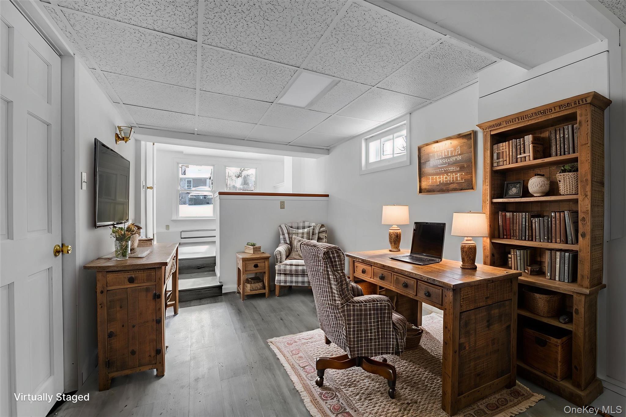 1117 St Johnland Road Kings Park, NY 11754 - Photo 9 of 20 Lovely home office complete with a separate seating area - ideal for book nook