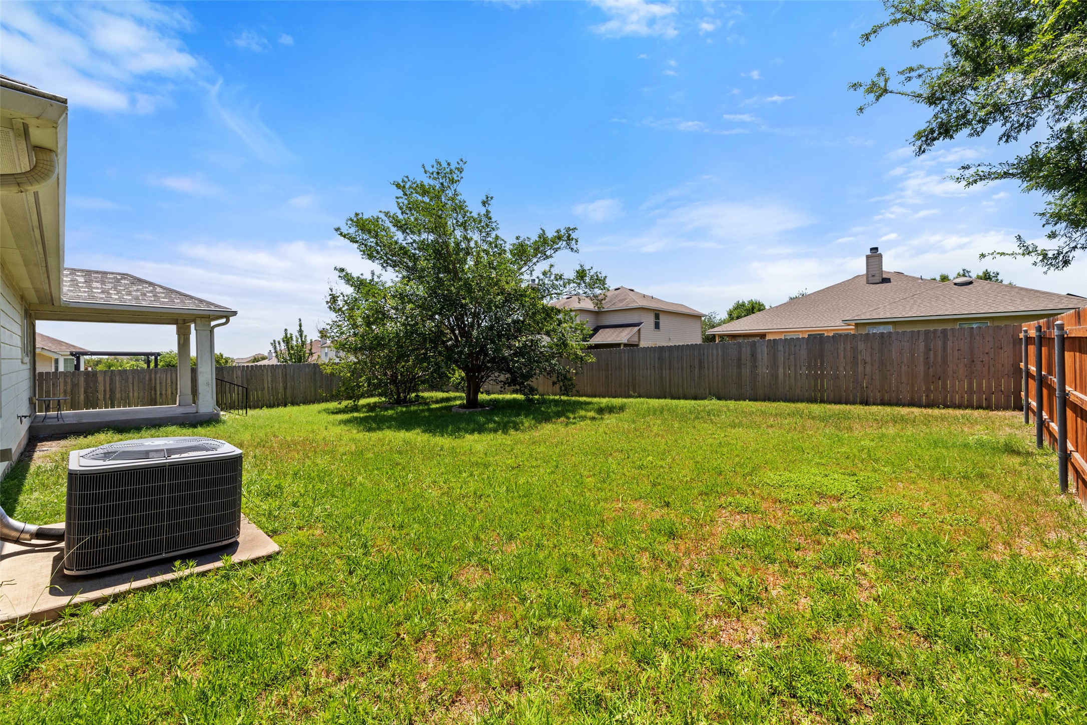 517 Castebar Drive Round Rock, TX 78664 - Photo 29 of 37 View of yard with cooling unit