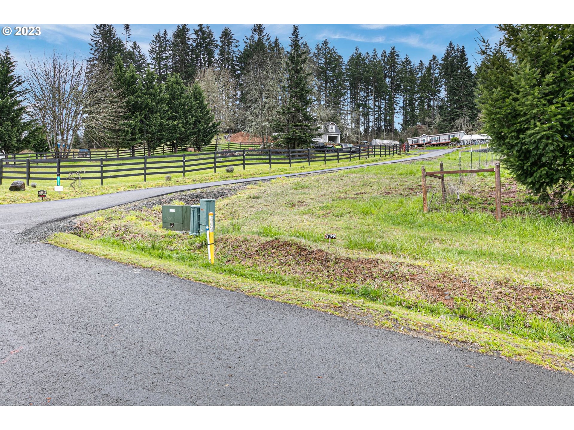 78124 Daybreak Drive Cottage Grove, OR 97424 - Photo 13 of 46 a view of a yard with a swimming pool