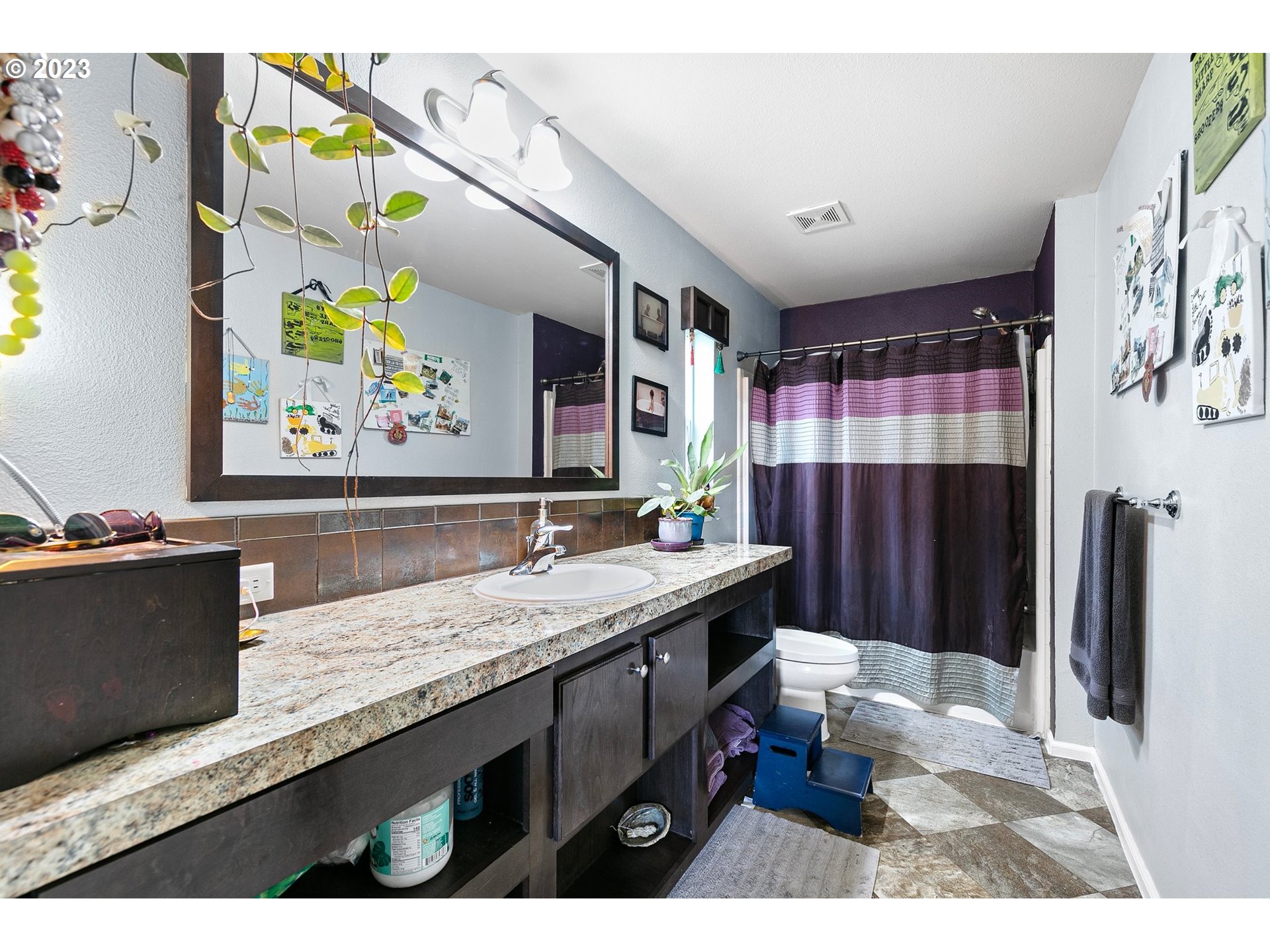 78124 Daybreak Drive Cottage Grove, OR 97424 - Photo 25 of 46 a bathroom with a sink a vanity and a mirror