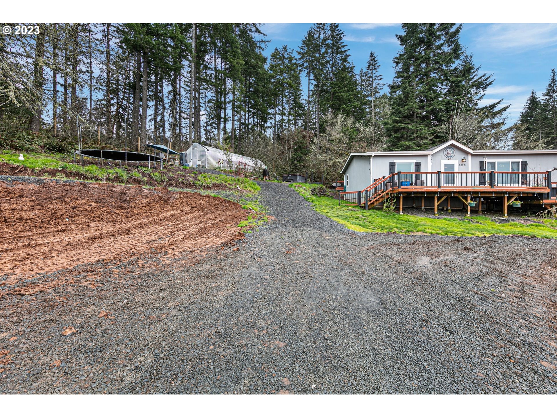 78124 Daybreak Drive Cottage Grove, OR 97424 - Photo 36 of 46 a view of a house with a yard and sitting area