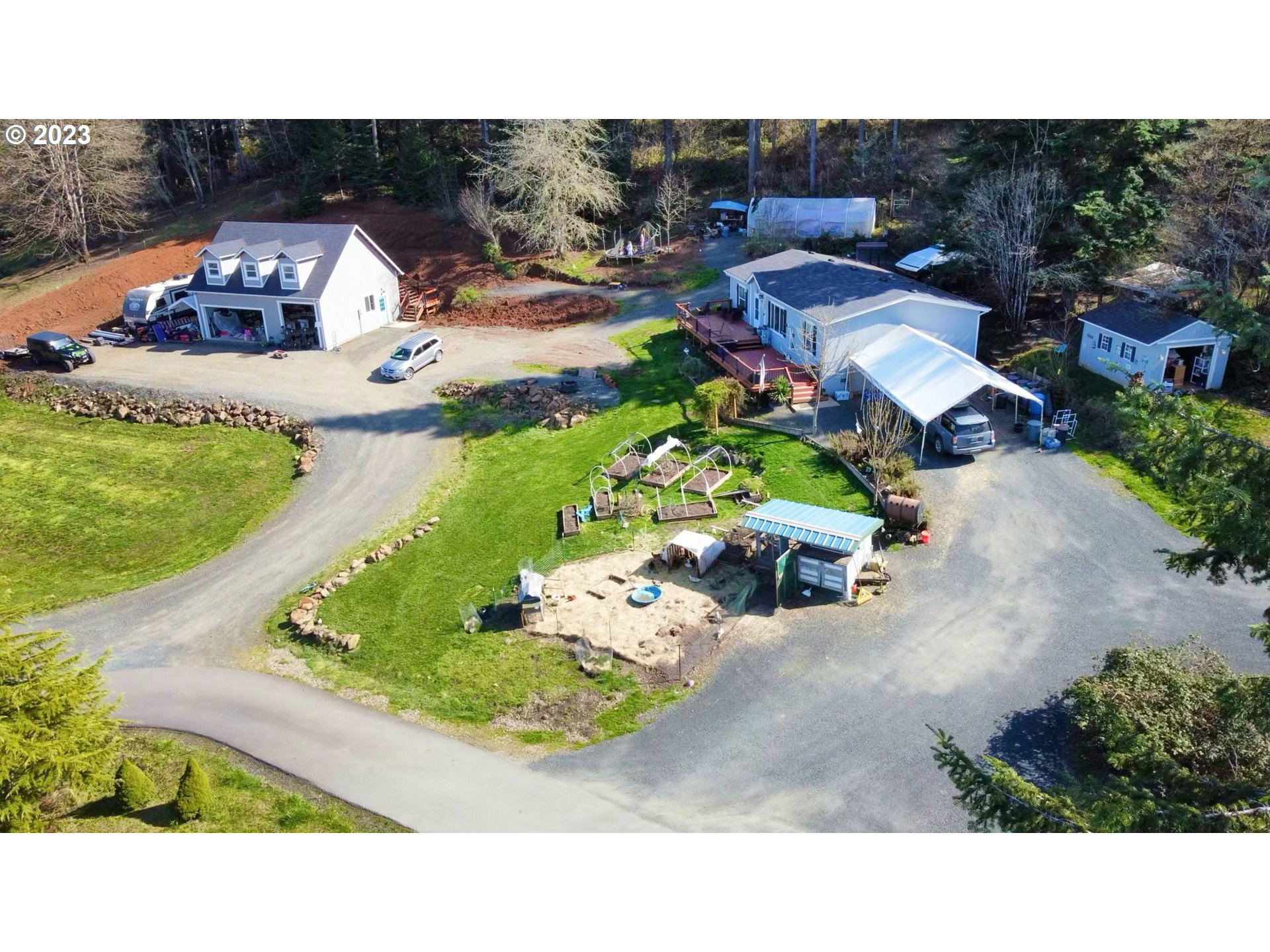 78124 Daybreak Drive Cottage Grove, OR 97424 - Photo 42 of 46 an aerial view of a house with a garden