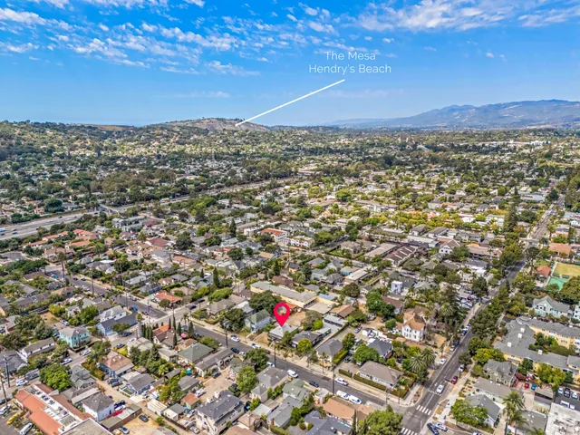 an aerial view of residential building and city